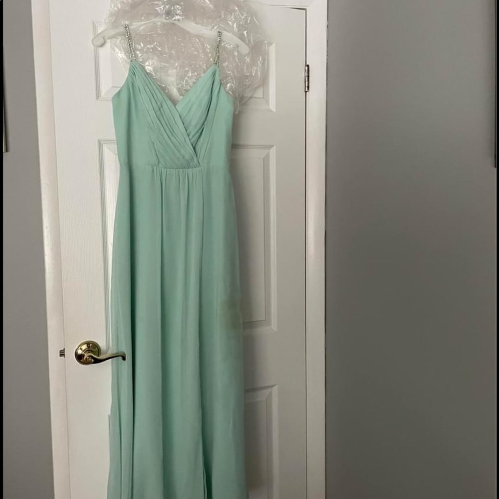 Mint green beaded spaghetti strap prom dress